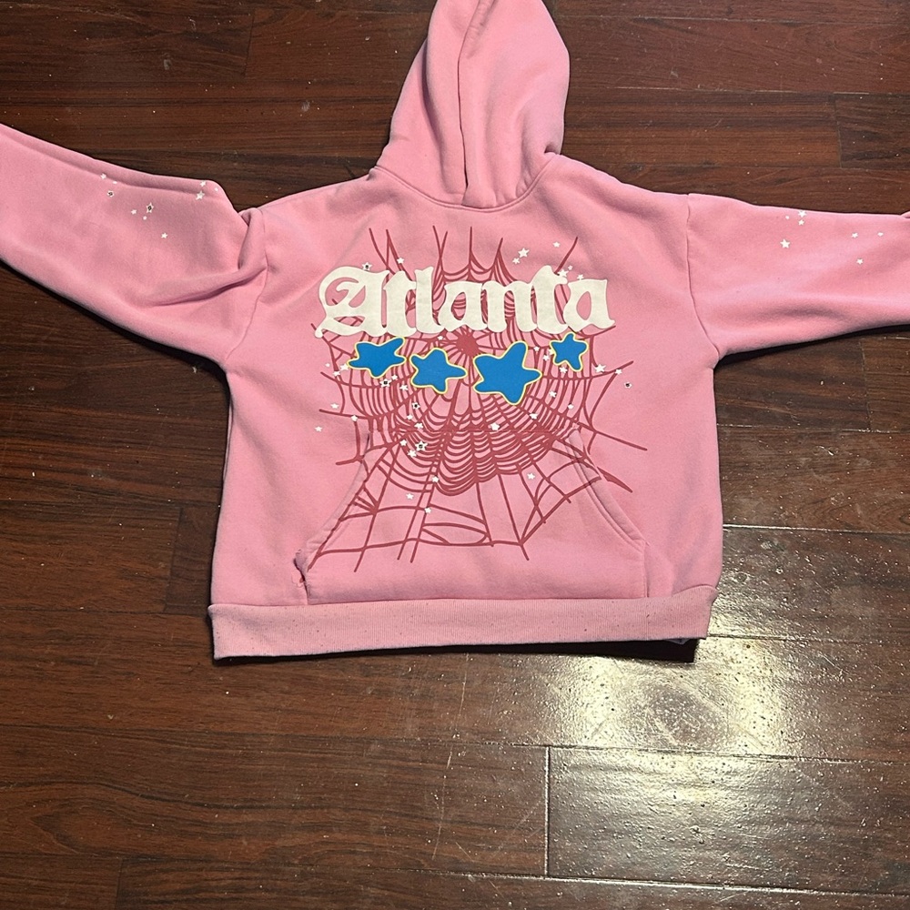 Stylish Pink Hoodie with Web and Star Design